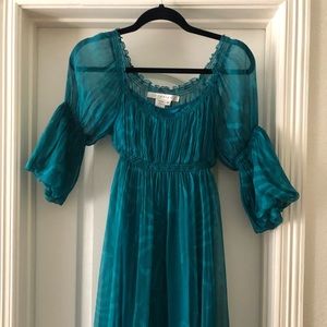 Chic and sexy dress in beautiful deep teal color.